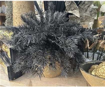 künstlicher Kiefernzweig beglittert, schwarz
