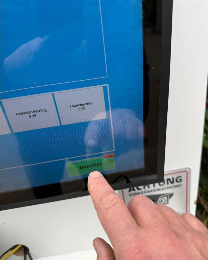 Bedienung des Touchscreens an der SB-Kasse